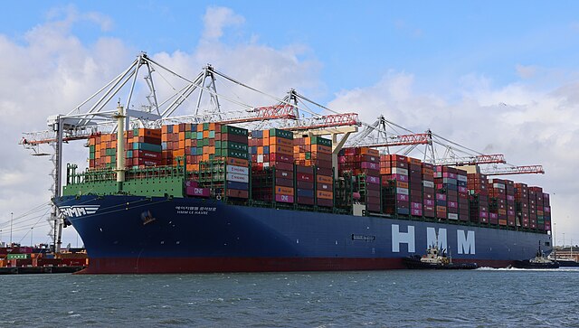 HMM container ship loading containers at Southampton port