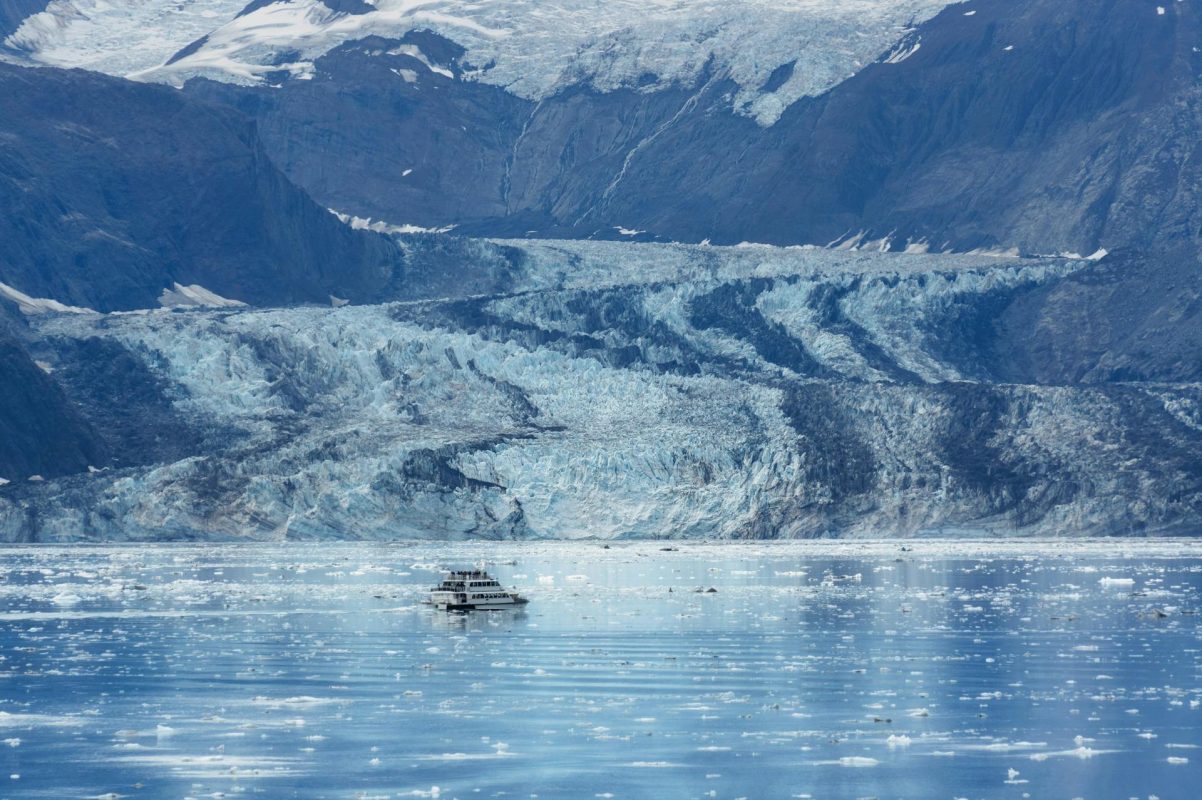 Small ship cruising icy Alaska seas during expedition season