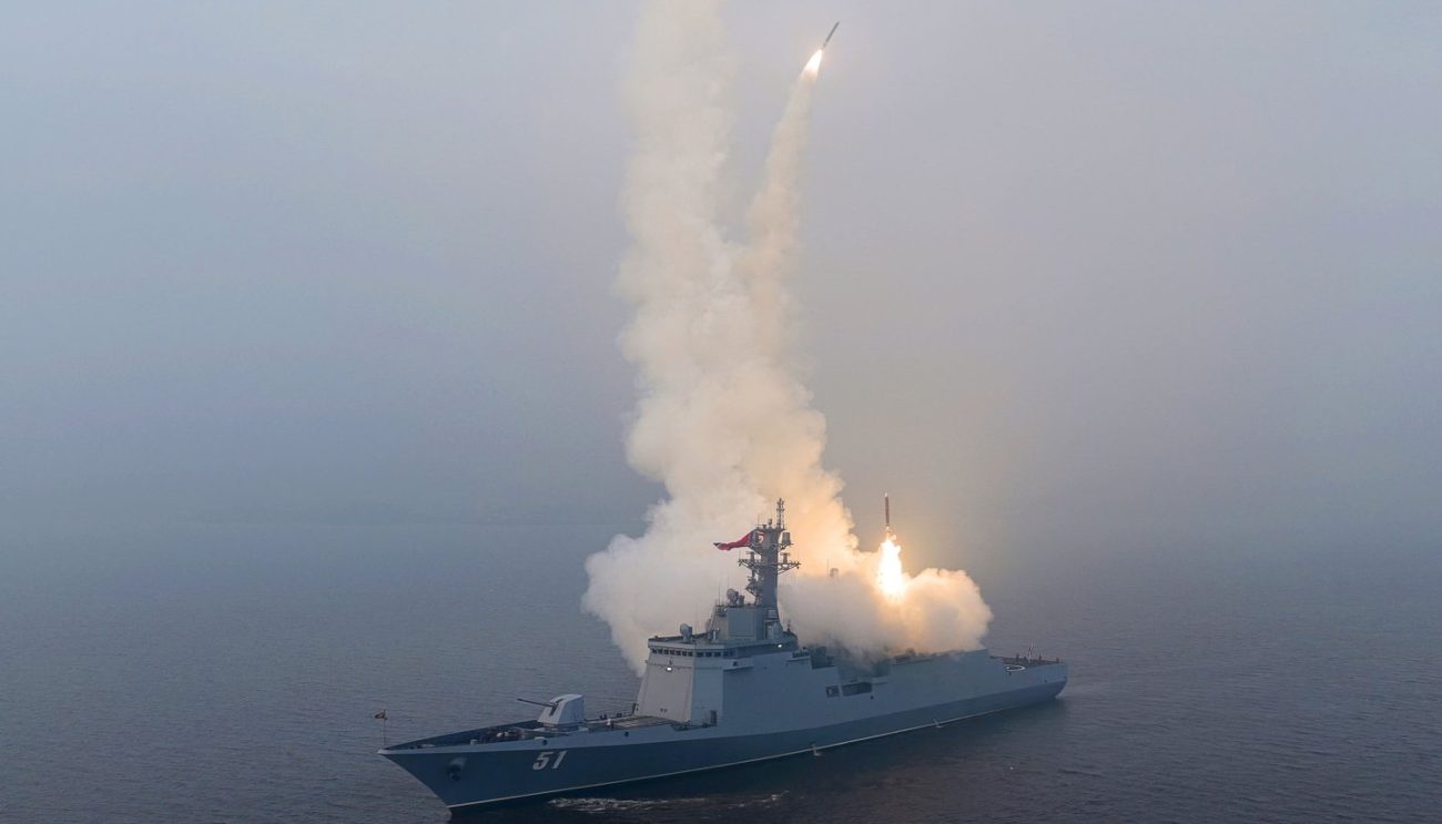 North Korea guided missile destroyer Choe Hyon launching missiles during sea trials.