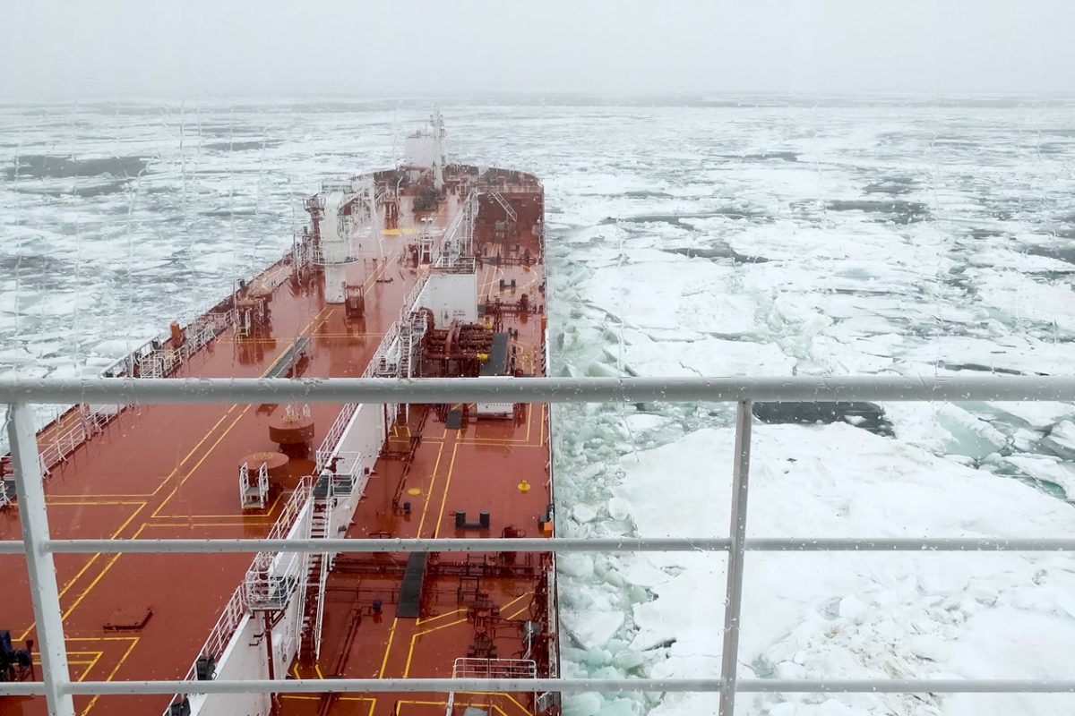 Arctic tanker navigating northern waters transporting liquefied natural gas from Russian Arctic export projects