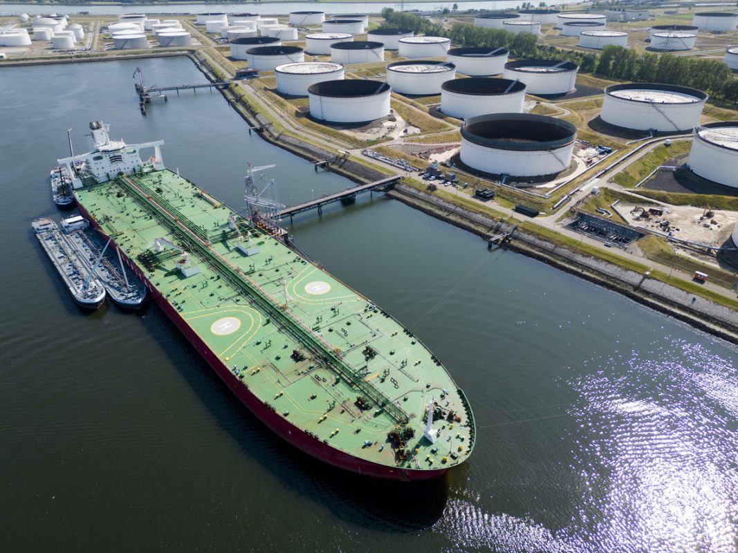 Crude oil tanker docked at the Port of Rotterdam energy terminal.