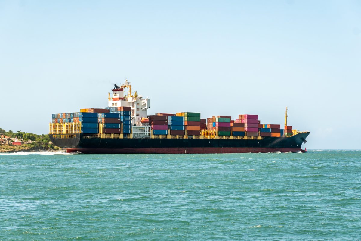 container ship at sea rerouting cargo from Strait of Hormuz to East Africa ports