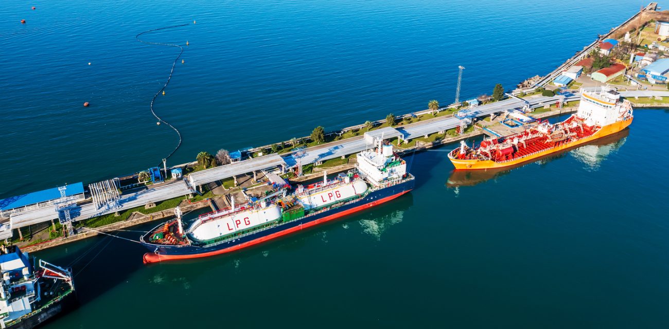 LPG tankers moored at marine terminal loading liquefied petroleum gas cargo