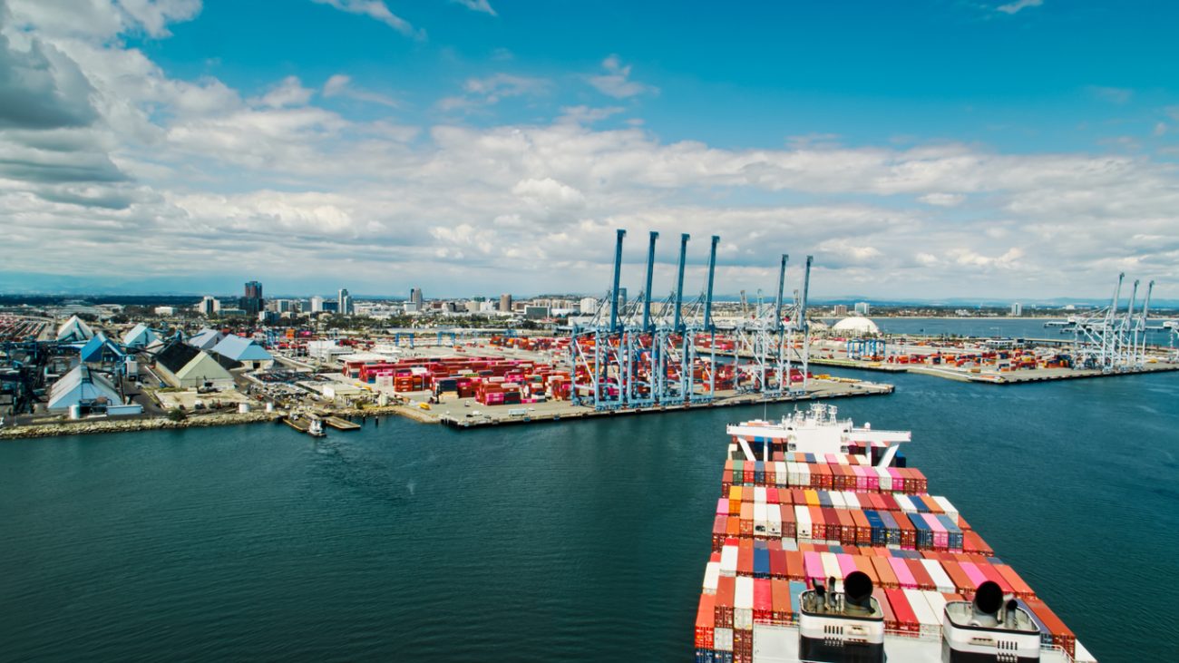 Container ship approaching terminal at Port of Long Beach showing U.S. port infrastructure and cargo operations