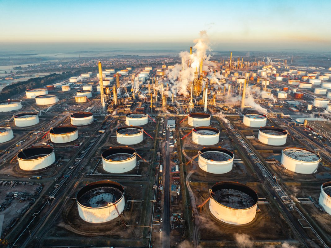 Oil refinery complex processing crude oil within the global energy supply chain
