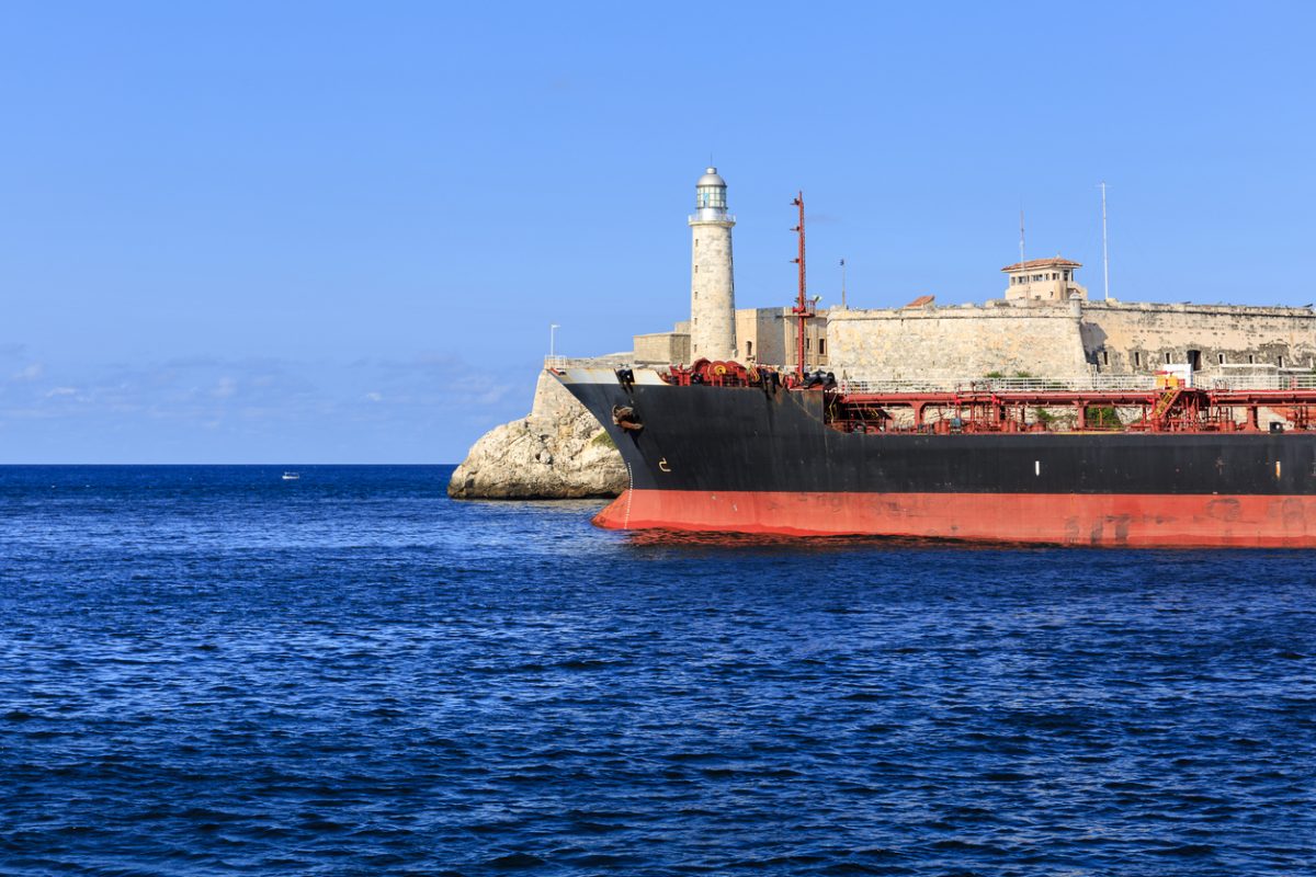 Ship near Havana harbor entrance by Castillo del Morro illustrating tanker traffic heading to Cuba