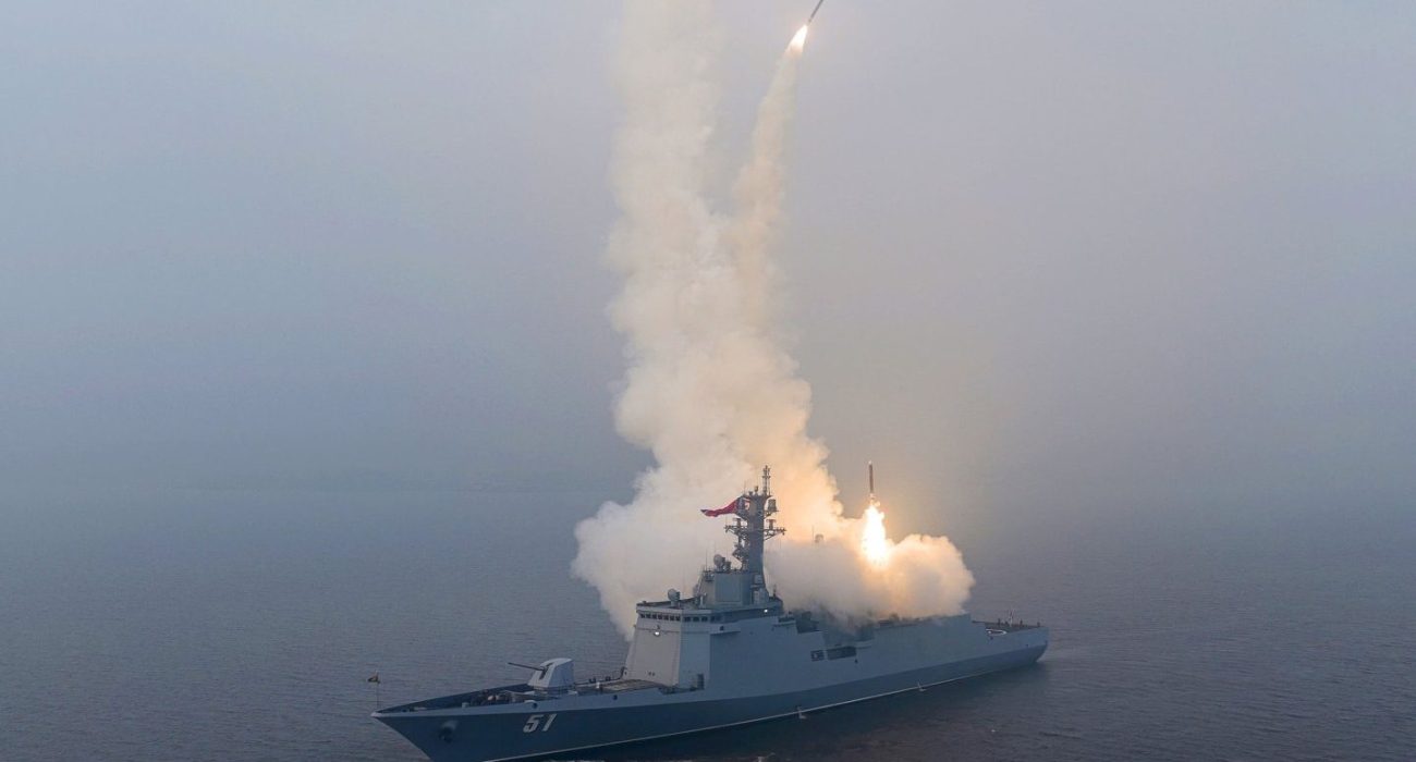 North Korea guided missile destroyer Choe Hyon launching missiles during sea trials.