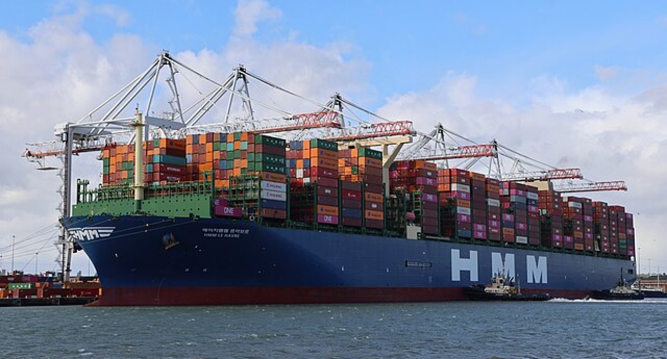 HMM container ship loading containers at Southampton port