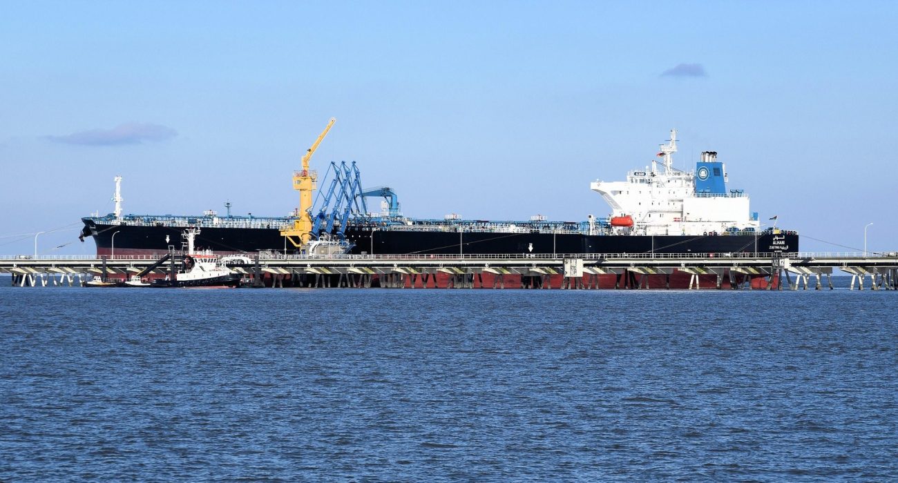 Oil tanker loading crude at export terminal, representational image of global oil shipping