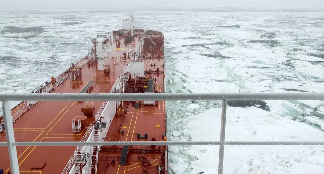 Arctic tanker navigating northern waters transporting liquefied natural gas from Russian Arctic export projects
