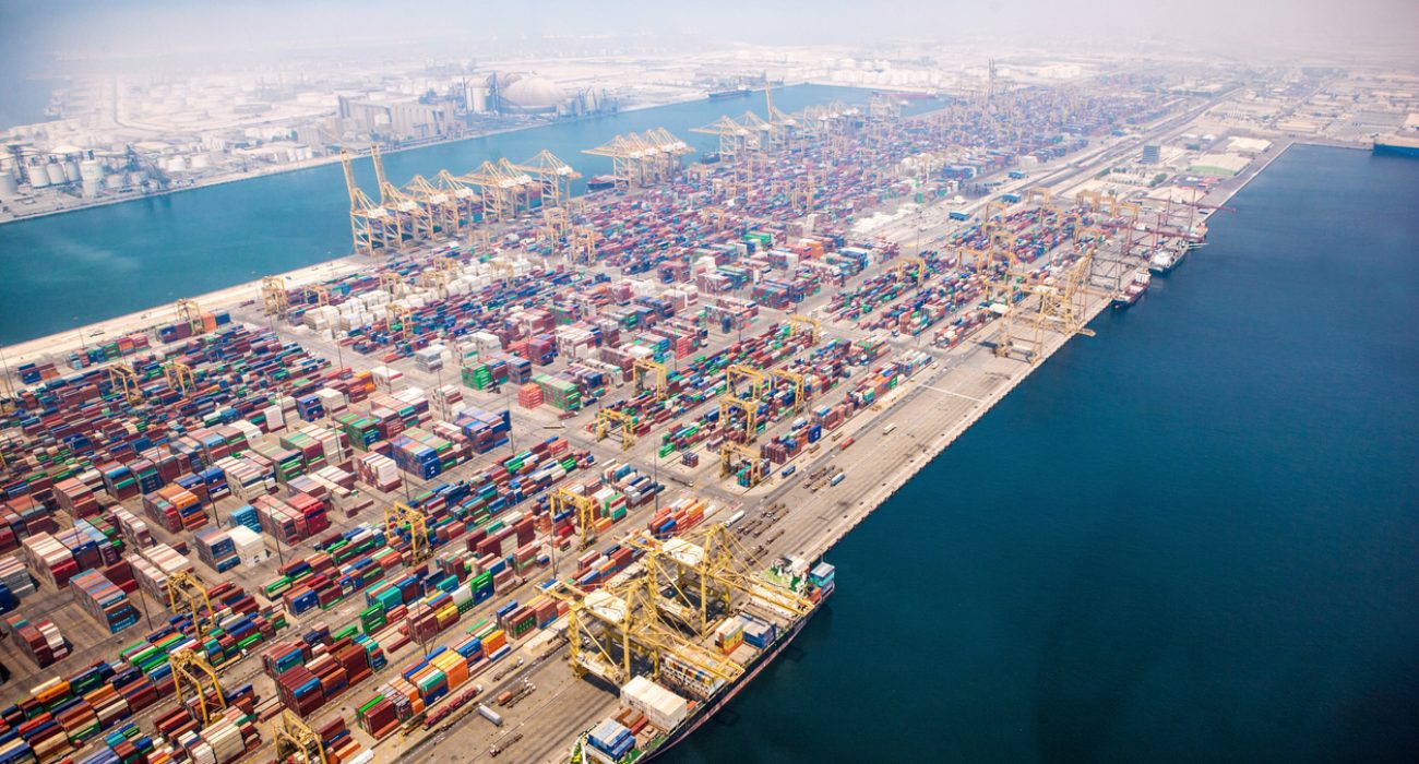 Jebel Ali Port container terminal in Dubai handling cargo ships and containers in a major Middle East maritime logistics hub.