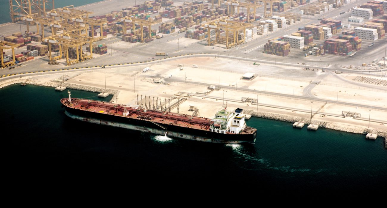 Container terminal operations at Jebel Ali Port Dubai, a major maritime logistics hub in the Persian Gulf.