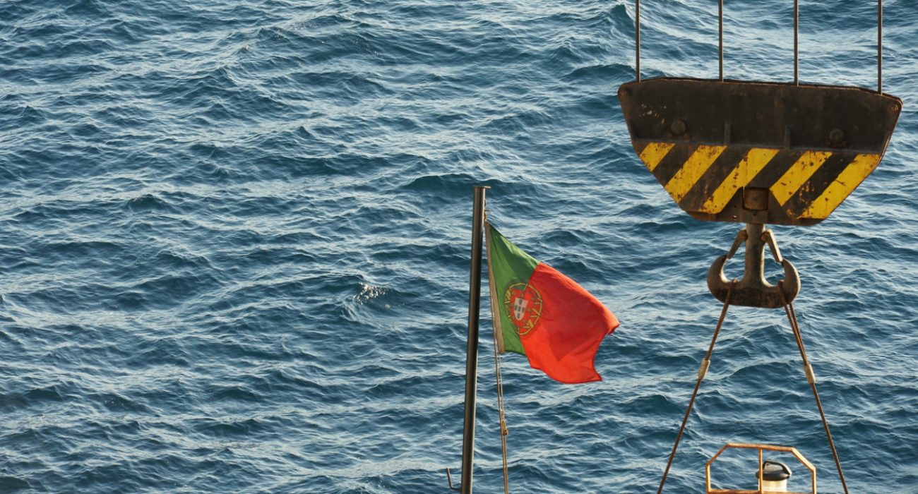 Portugal flag on stern of container ship