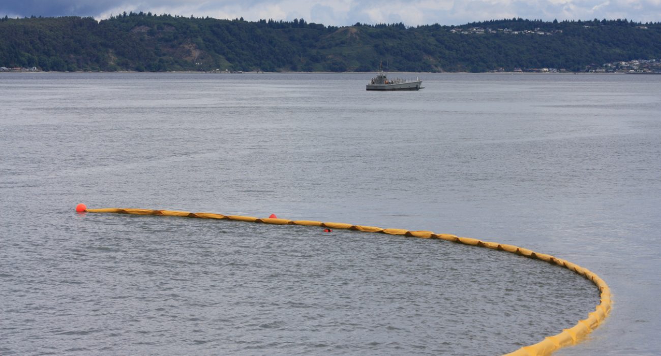 Oil containment boom deployed during offshore oil spill cleanup