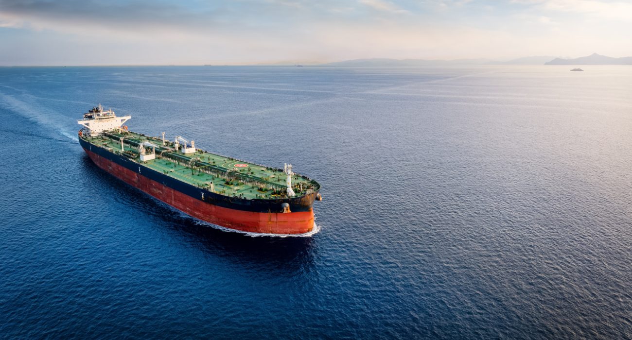 Large crude oil tanker transporting crude oil cargo across global shipping routes to Asian markets.