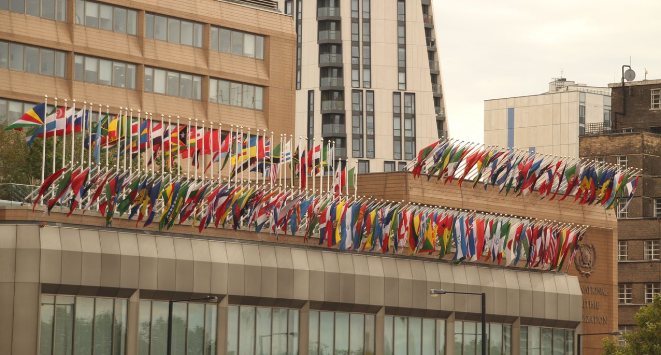 International Maritime Organization headquarters in London with national flags, IMO maritime safety body