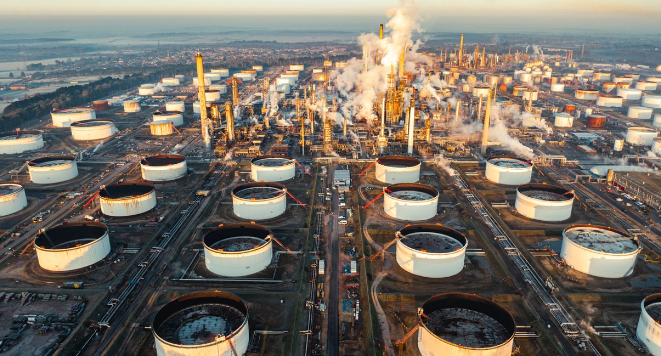 Oil refinery complex processing crude oil within the global energy supply chain