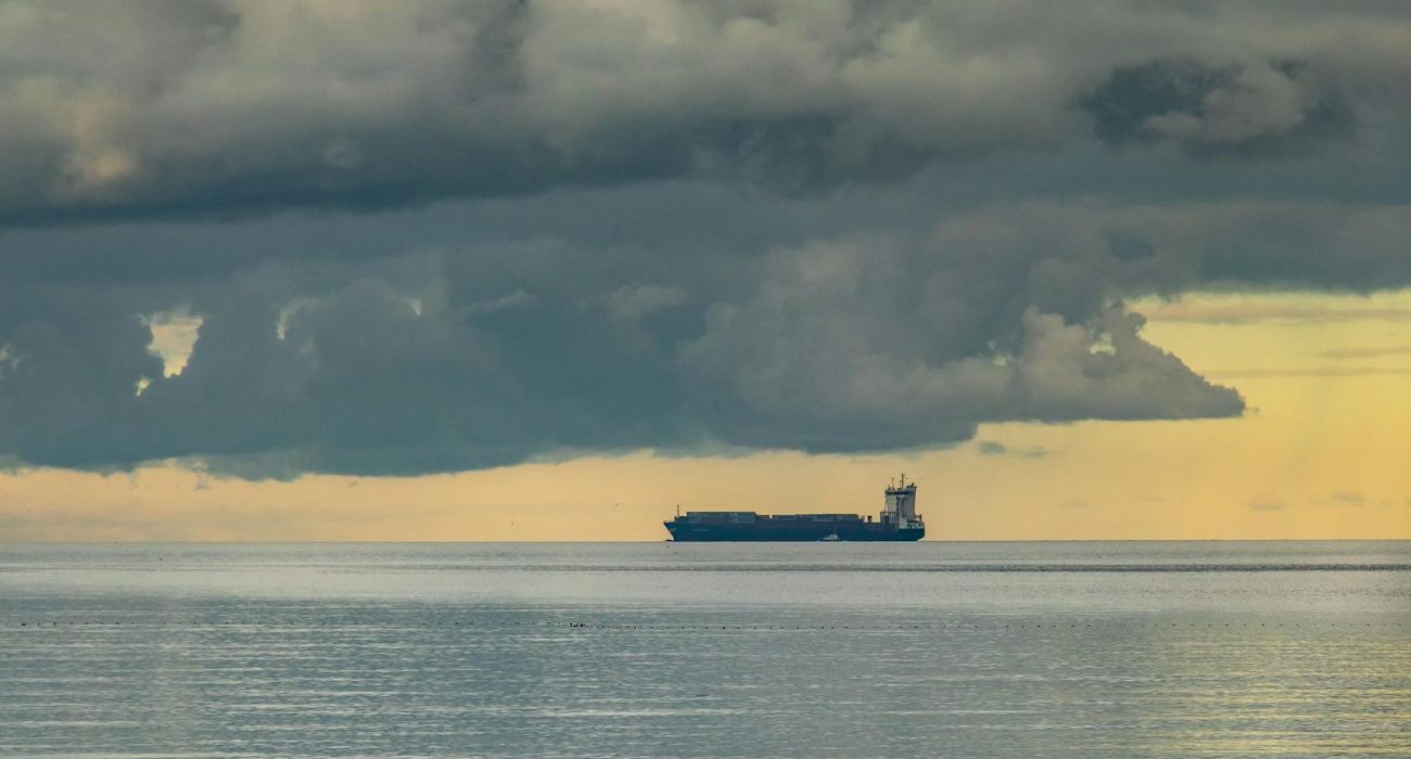 Oil tanker on the horizon in open sea